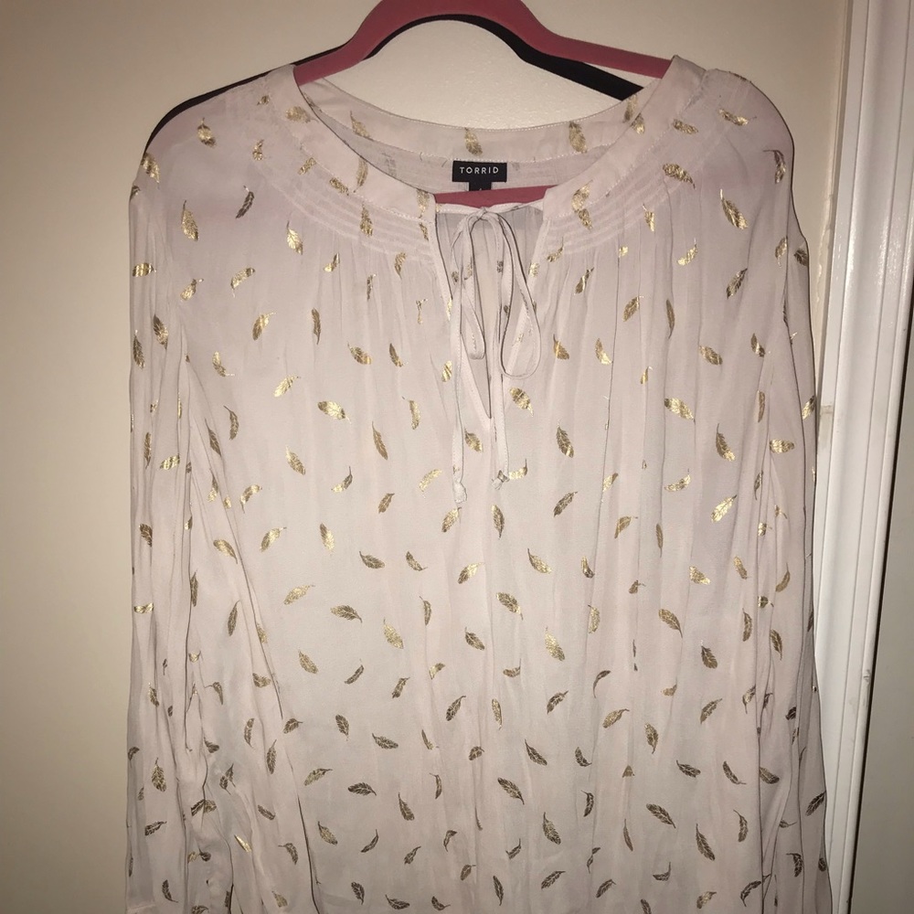Cream blouse with gold foil feather detail